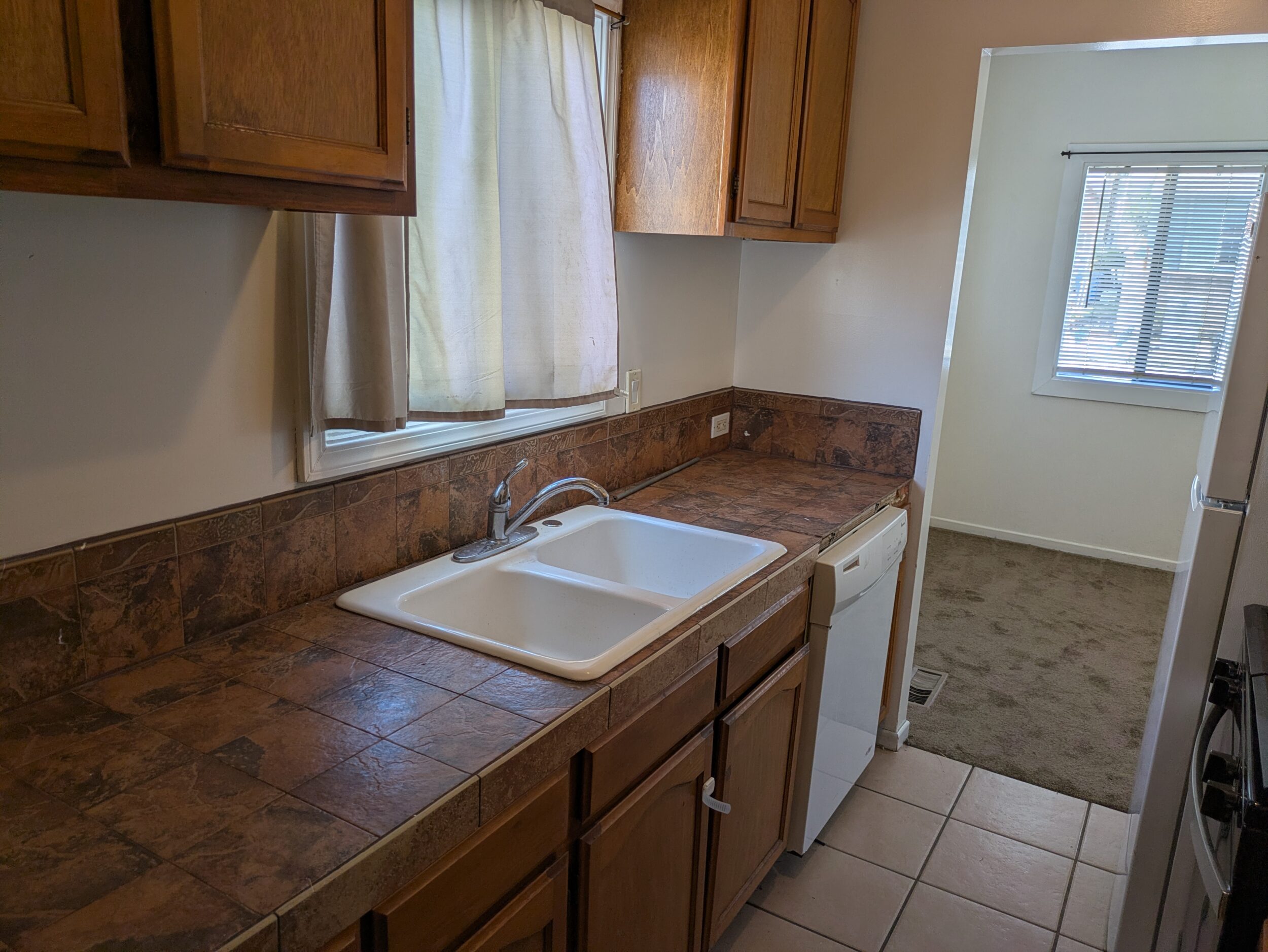 Kitchen, dishwasher at the far end